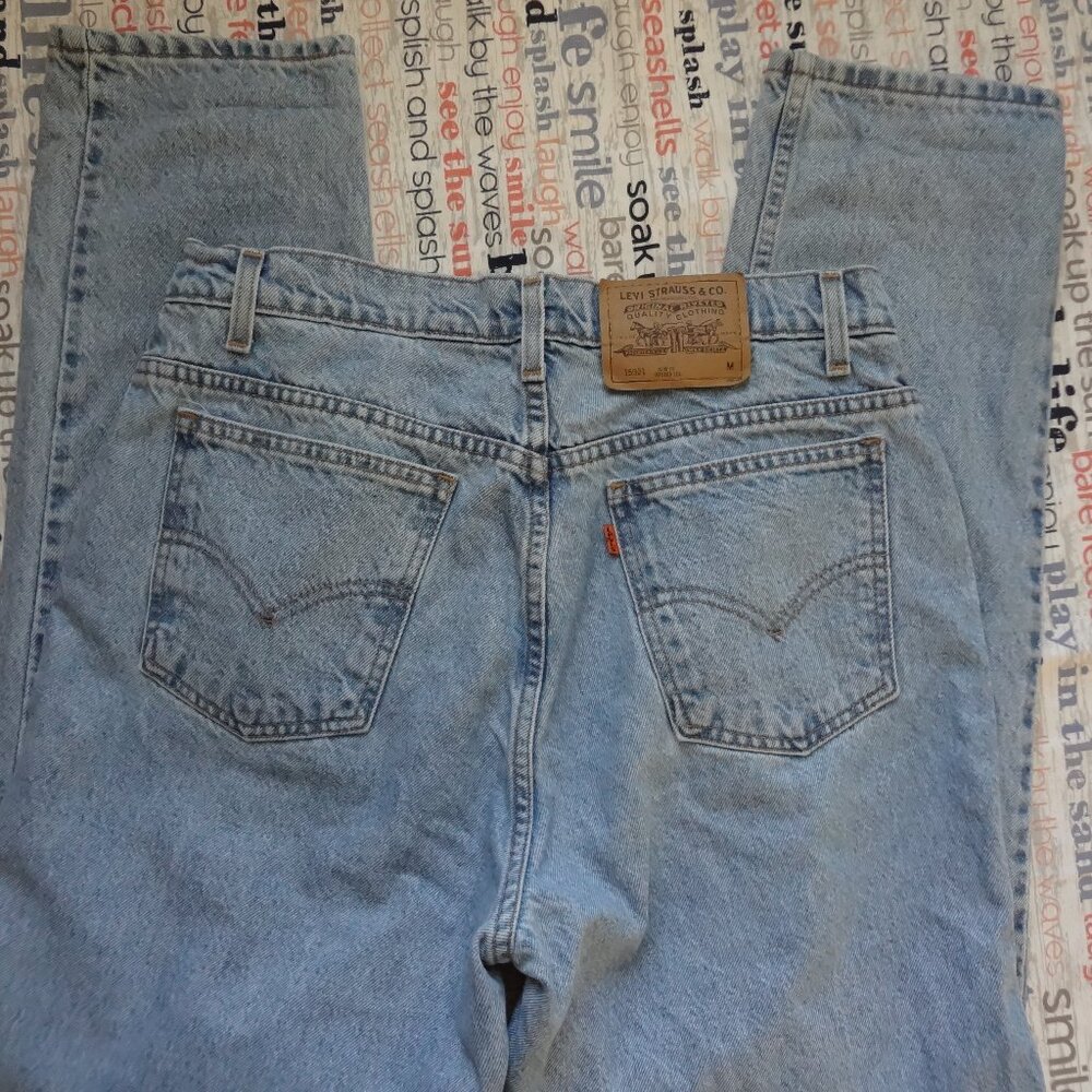 SIZE 14 reg M. Vintage Levi’s 912 orange tab light blue jeans.
